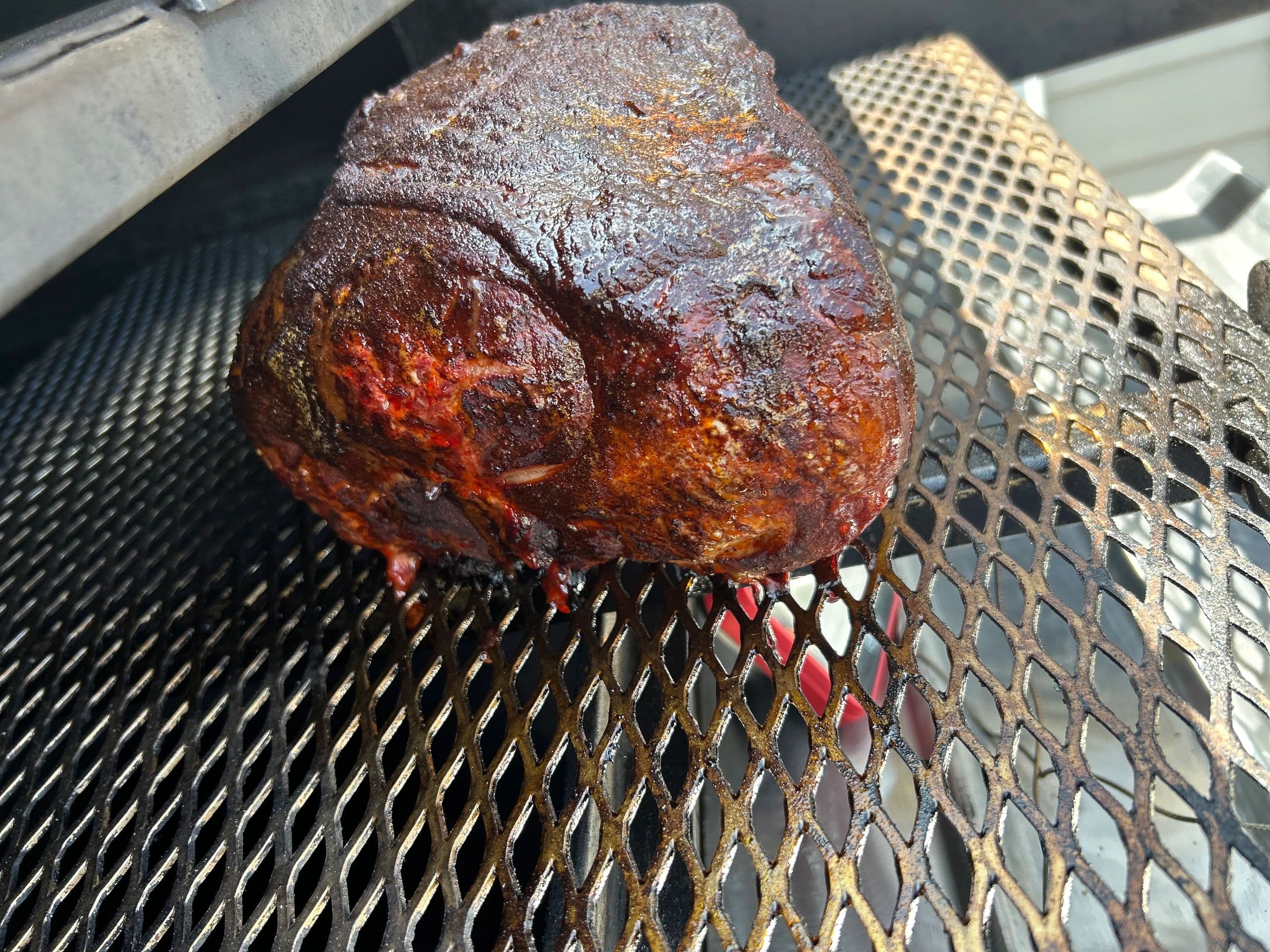 Brisket on the grill rack